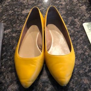 Yellow pointy toed flats - gently worn.